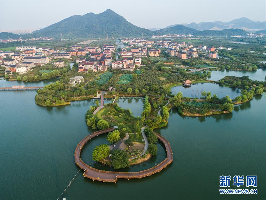 (新華全媒頭條·圖文互動(dòng))(9)生態(tài)文明之光照耀美麗中國(guó)——寫在綠水青山就是金山銀山理念提出15周年之際
