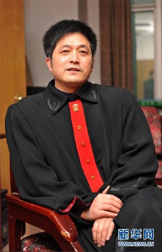 （圖文互動）其人如蘭，既潔且馨&mdash;&mdash;追記&ldquo;全國模范法官&rdquo;胡國運(yùn)