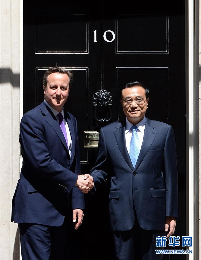 6月17日，國(guó)務(wù)院總理李克強(qiáng)在倫敦唐寧街10號(hào)首相府同英國(guó)首相卡梅倫舉行中英總理年度會(huì)晤。新華社記者 李濤 攝