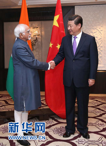 9月18日，國家主席習(xí)近平在新德里會見印度副總統(tǒng)兼聯(lián)邦院議長安薩里。 新華社記者 龐興雷 攝