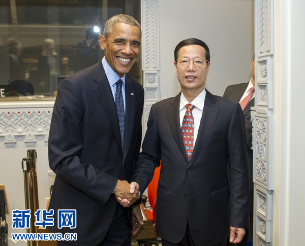 9月23日，國(guó)家主席習(xí)近平特使、國(guó)務(wù)院副總理張高麗在紐約會(huì)見(jiàn)出席聯(lián)合國(guó)氣候峰會(huì)的美國(guó)總統(tǒng)奧巴馬。 新華社記者王曄攝