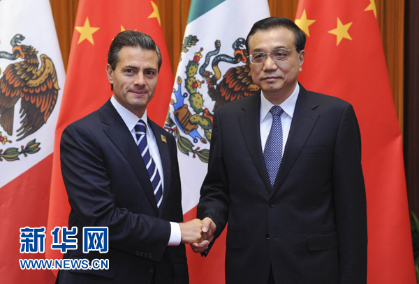 11月11日，國務院總理李克強在北京人民大會堂會見來華進行國事訪問并出席亞太經(jīng)合組織第二十二次領導人非正式會議的墨西哥總統(tǒng)培尼亞。新華社記者張鐸 攝 