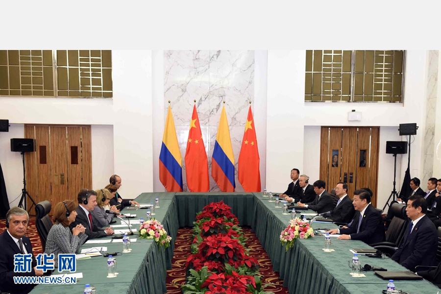 11月18日，國家主席習(xí)近平在菲律賓馬尼拉會見哥倫比亞總統(tǒng)桑托斯。 新華社記者 饒愛民 攝