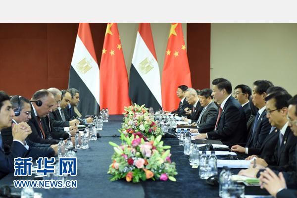 12月4日，國家主席習近平在約翰內斯堡會見埃及總理伊斯梅爾。新華社記者 張鐸 攝 