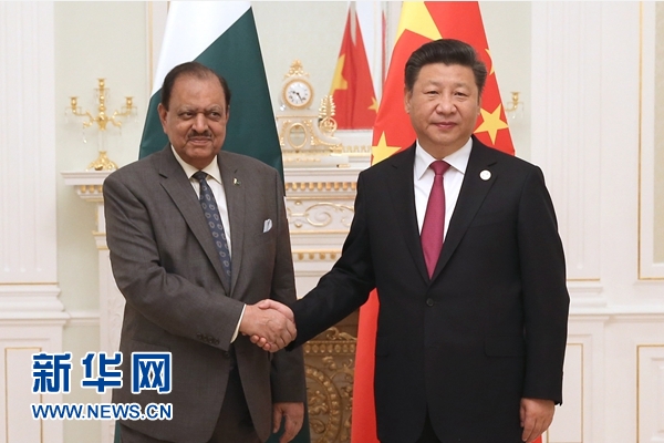 6月23日，國家主席習近平在塔什干會見巴基斯坦總統(tǒng)侯賽因。新華社記者馬占成攝