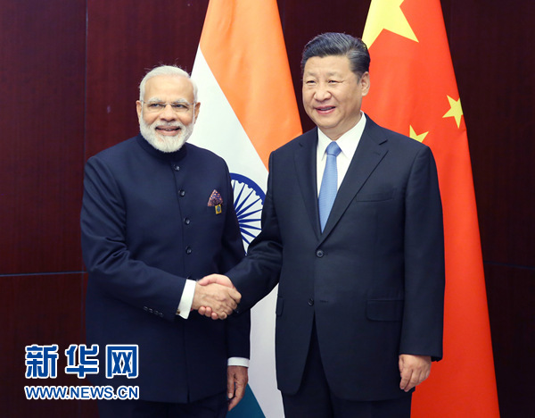 6月9日，國家主席習近平在阿斯塔納會見印度總理莫迪。 新華社記者姚大偉 攝