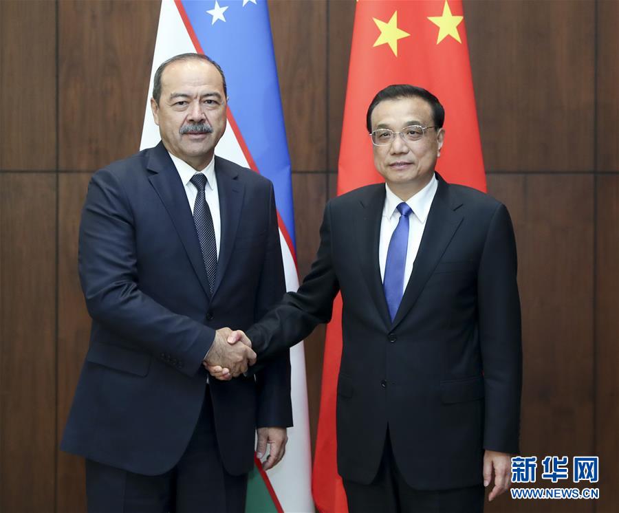(時政)李克強(qiáng)會見烏茲別克斯坦總理阿里波夫
