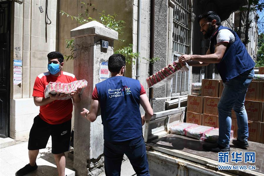 （國際疫情&middot;圖文互動）（2）通訊：疫情中，那抹笑容最難忘&mdash;&mdash;記向困難家庭發(fā)放愛心包裹的敘利亞青年志愿者