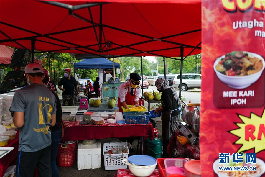 （國際&middot;圖文互動(dòng)）（5）通訊：前方總有機(jī)遇&mdash;&mdash;記馬來西亞一位飛行員疫情下擺攤再就業(yè)